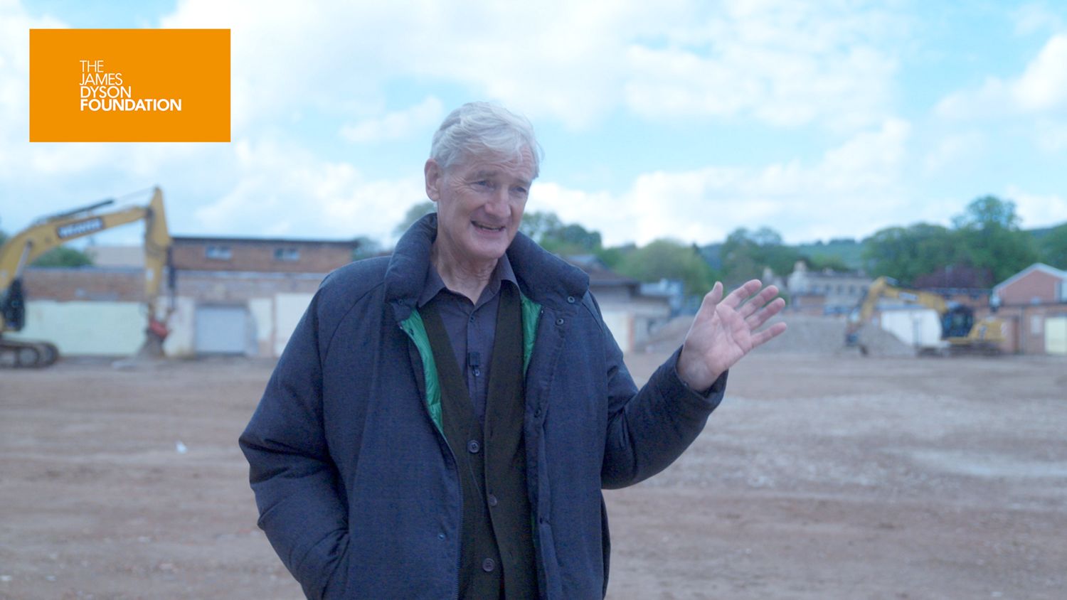 James Dyson standing outside Dyson Cancer Centre site.